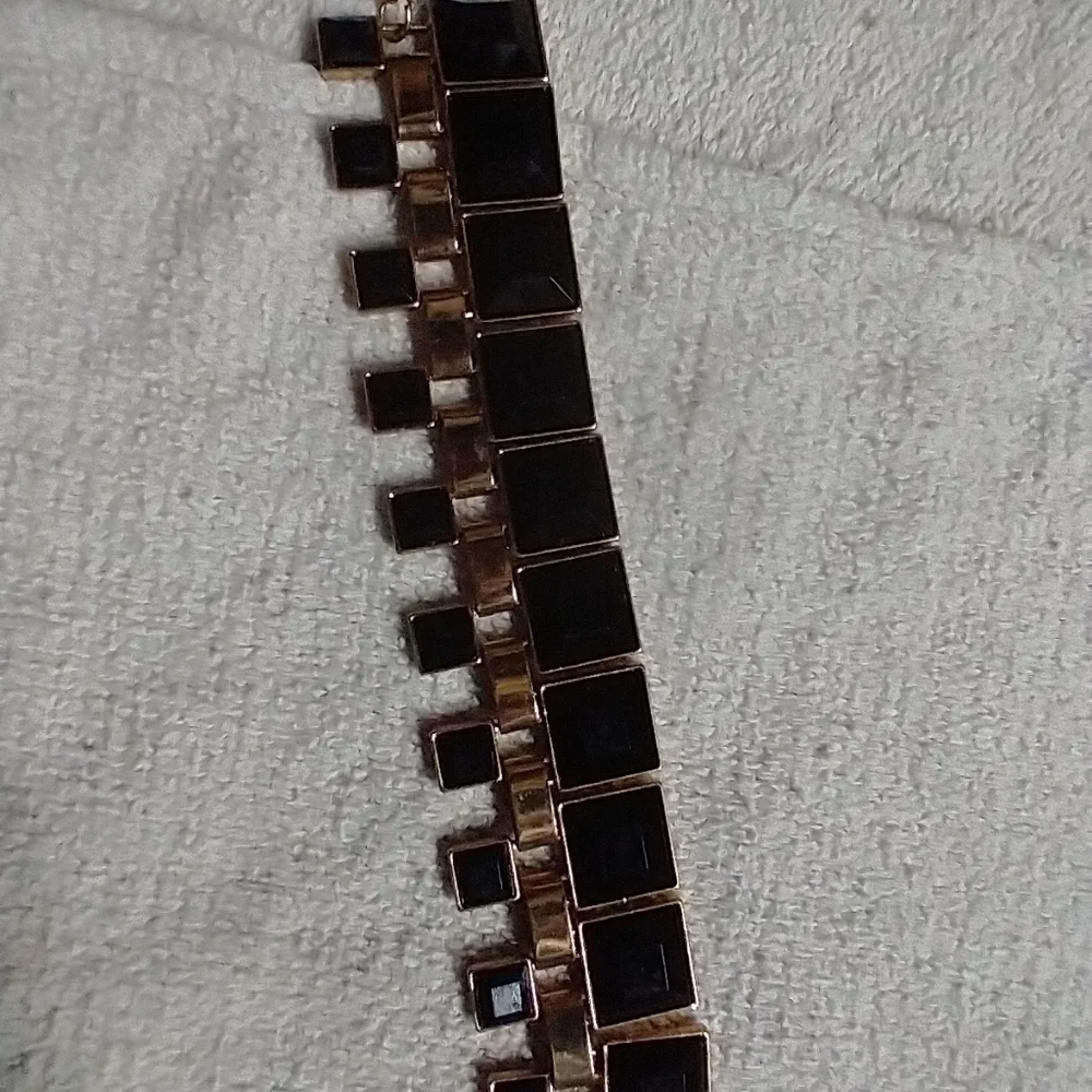Goldtone black square bracelet